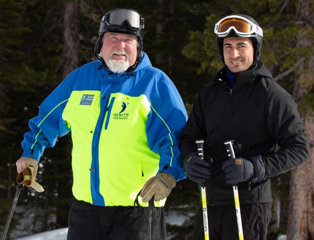 Ignite Veteran Athlete and Volunteer Instructor smiling in their ski gear