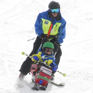 David Levin navigating an Ignite Athlete in a sit ski