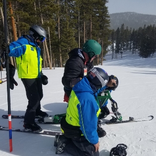 Ignite Athlete Kevin Sheehan preparing for a run with Ignite Volunteer Instructors' support