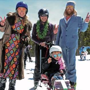 Megan Gregg and her family during an Ignite Adaptive Sports lesson